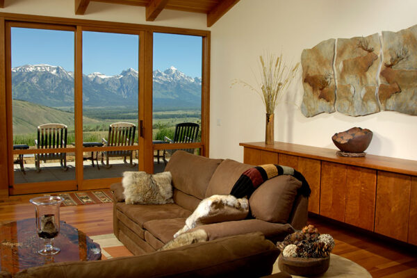 mountain views, elk triptych by Brent Lawrence; bowl by Lee Brotherton; wood cabinet by David Trapp